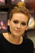 http://img220.imagevenue.com/loc1097/th_63423_Hilary_Duff_signing_copies_of_her_book_Elixir_in_Miami42b_122_1097lo.jpg