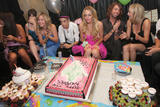 Lindsay Lohan in small pink dress shows cleavage and dwonblosue view at her breasts at her 22nd birthday party at Teddy's Roosevelt hotel