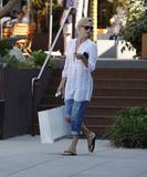 th_10719_Celebutopia-Charlize_Theron_shopping_in_Malibu-02_122_486lo.jpg