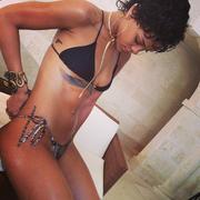 Rihanna - wearing a bikini in some Twitpics 08/07/2013