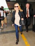th_92055_NaomiWatts_ArrivesintoLAXAirportOct172011_By_oTTo4_122_709lo.jpg