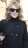 th_31129_celebrity-paradise.com-The_Elder-Kylie_Minogue_2010-02-17_-_leaving_her_managements_office_197_122_733lo.jpg
