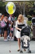 th_99196_Tikipeter_Billie_Piper_and_family_at_Disneyland_026_123_805lo.jpg