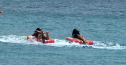 th_380736275_RihannaenjoysafunridewithfriendsonaboatinBarbados_125_122_843lo.jpg