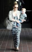 http://img220.imagevenue.com/loc1184/th_868754407_Hilary_Duff_takes_her_son_to_Babies_First_Class4_122_1184lo.jpg